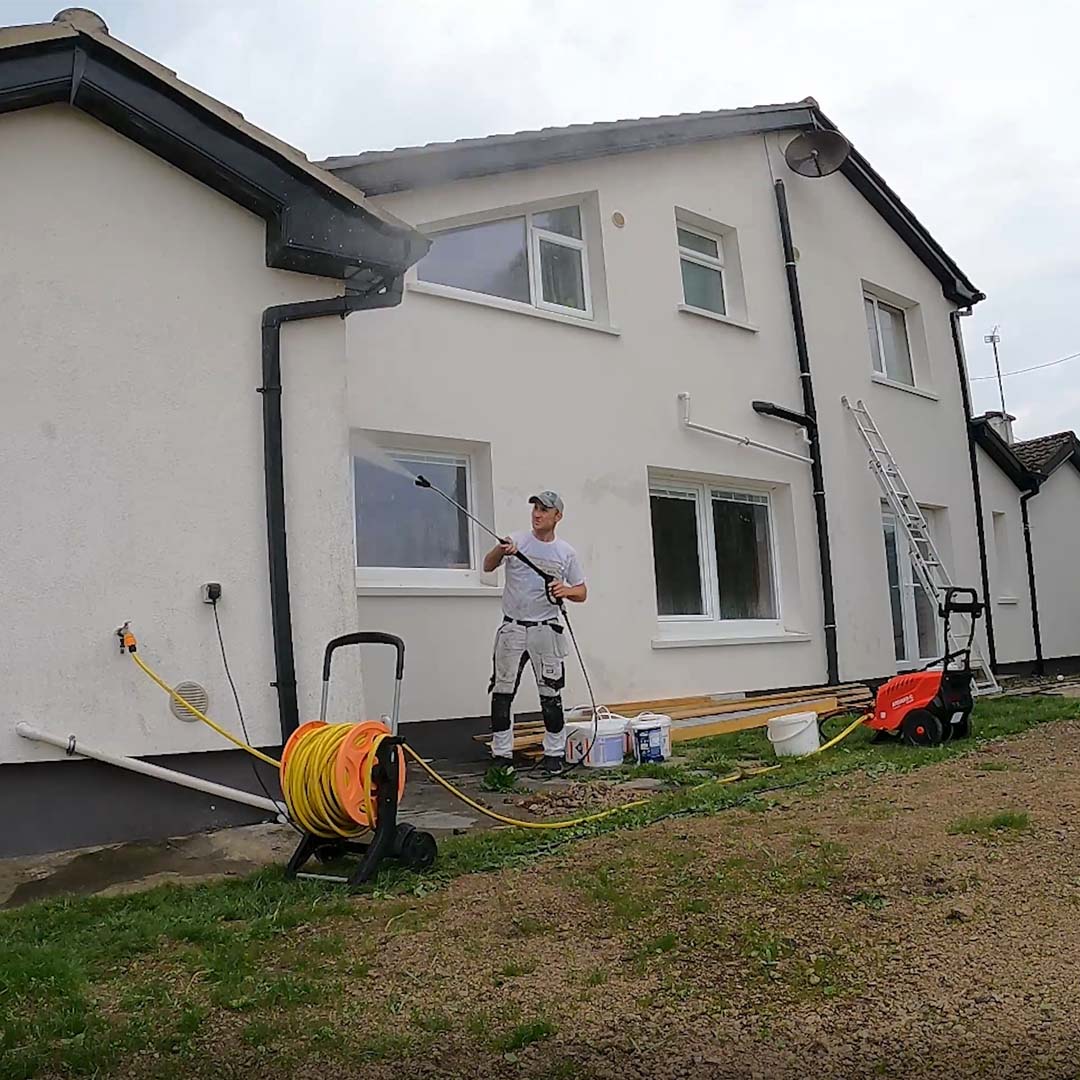 pressure washing exterior of the house